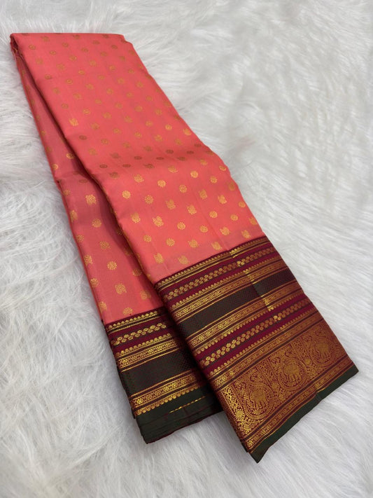 Coral Peach Kanchi Pattu silk saree with aubergine Korvai elephant zari border — Idam Living