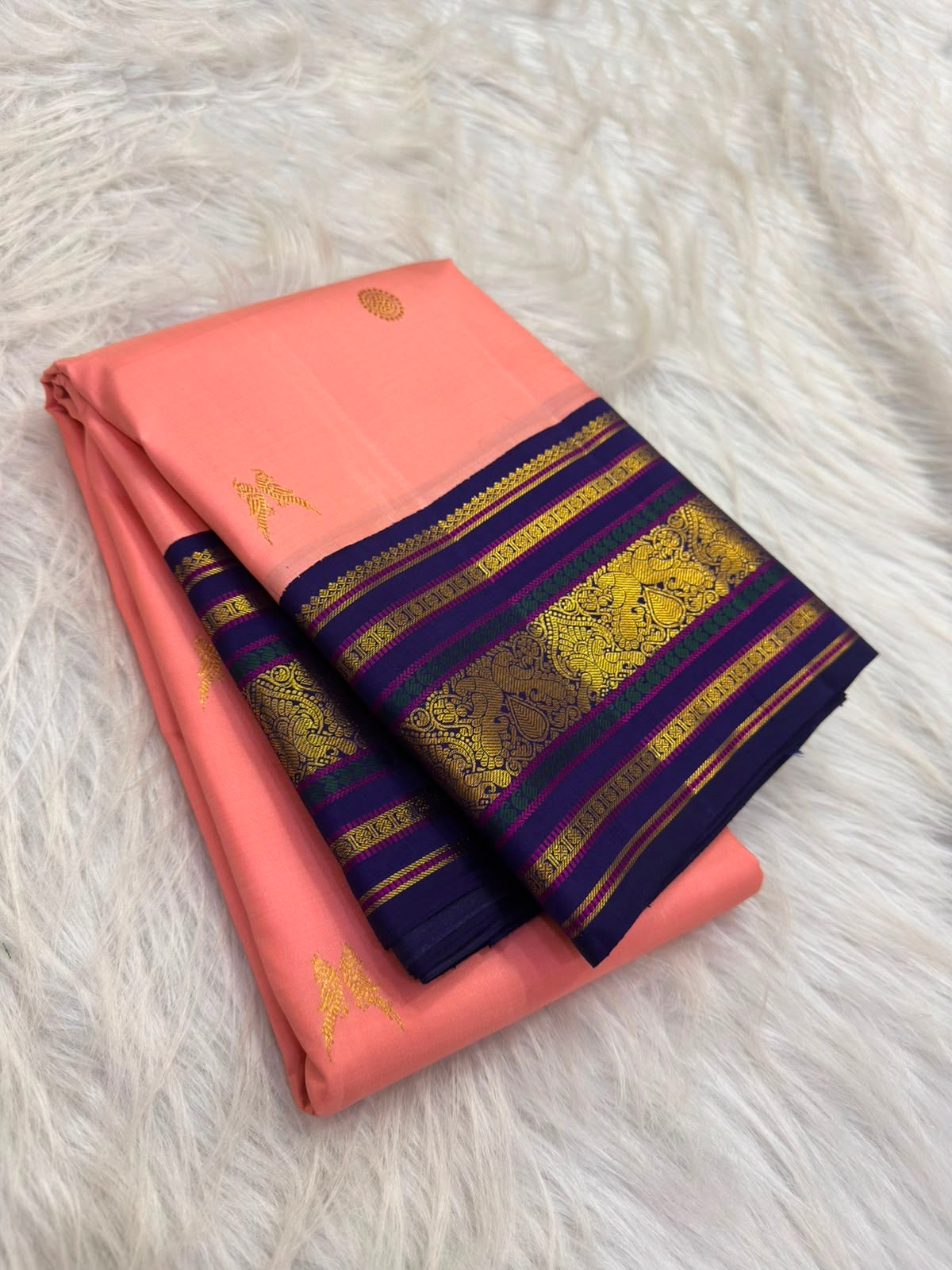 Erattai Kili double-parrot motif detail, coral-pink Kanjeevaram saree