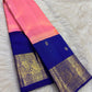 Coral Pink Pure Silk Kanchipuram Butta saree with grand Royal Blue Mayil zari border