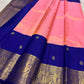 Coral Pink Kanjeevaram silk saree with Deep Royal Blue peacock zari border