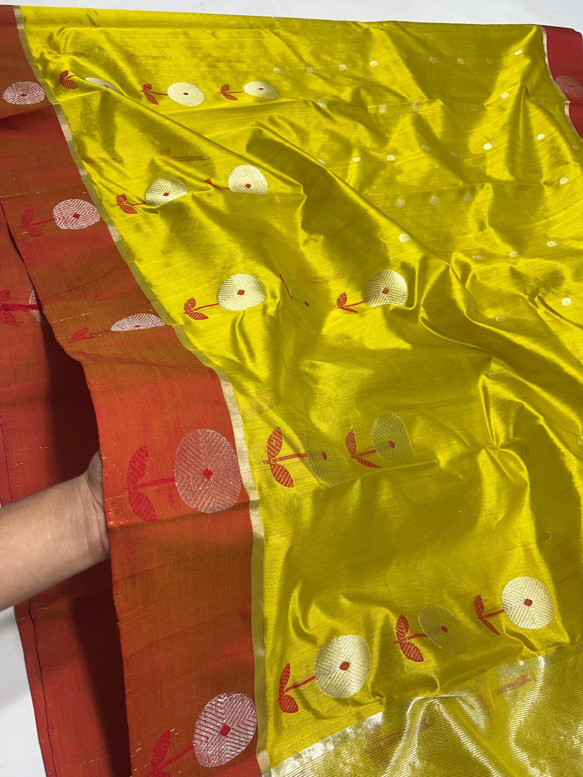 Coral red floral border with silver-gold blossoms on lime yellow Chanderi silk