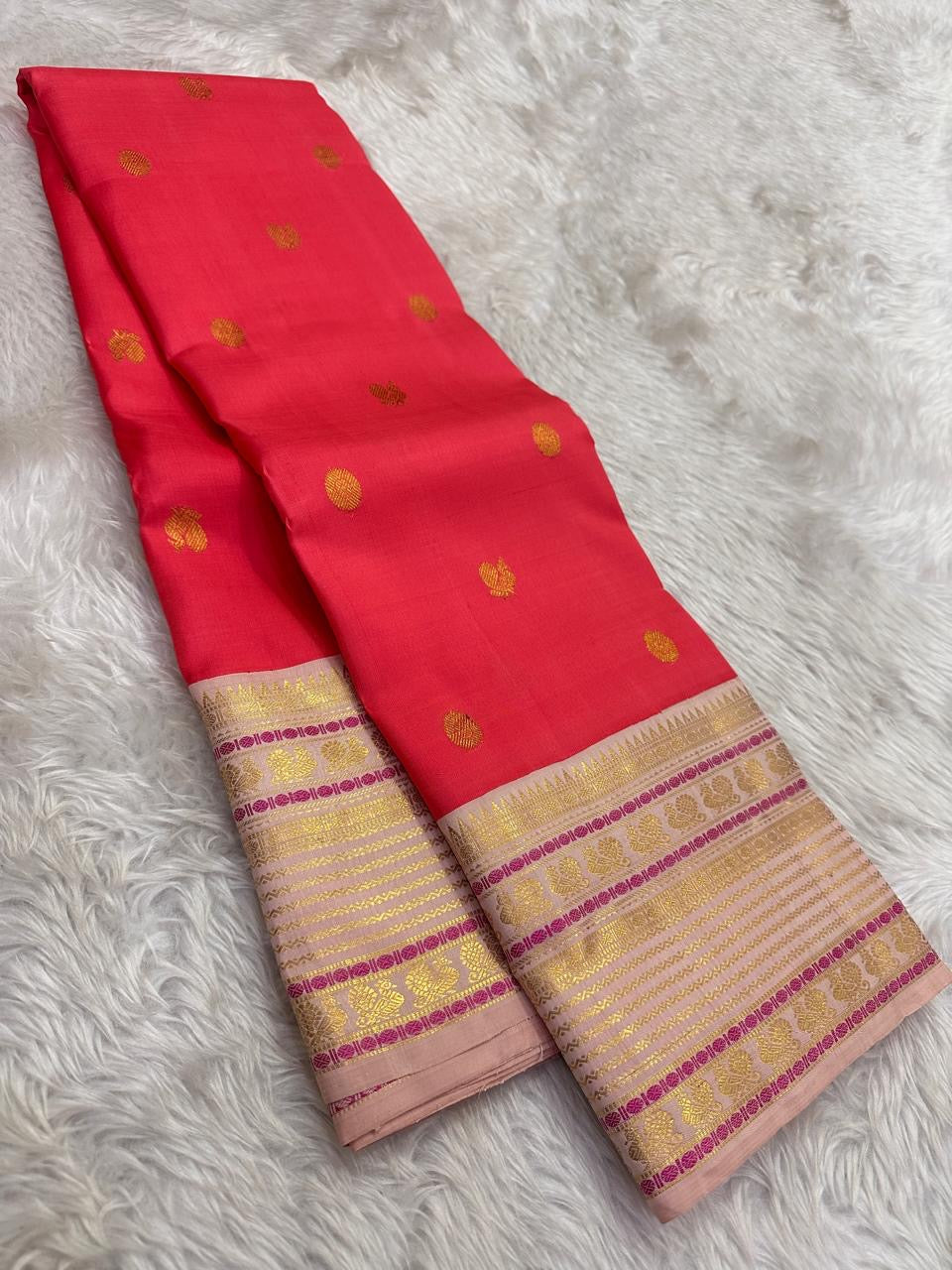 Coral Red Handwoven Pure Silk Kanjipuram Saree with Mayil Chakram Butta and Ganga Jamuna Border