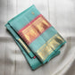 Sea-Glass Aqua Handwoven Pure Silk Kanchipuram Saree with Coral-Rose Rettapet Border and Gold Zari Buttas