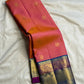 Coral sunset-orange handwoven Pure Silk Kanchipuram Zari Kattam saree with turquoise border