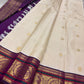 Cream Kancheepuram silk saree with lightweight Korvai purple border and Gandaberunda pallu — Idam Living