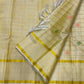 Cream Kanchi Kattam grid body close-up showing coral-green butta