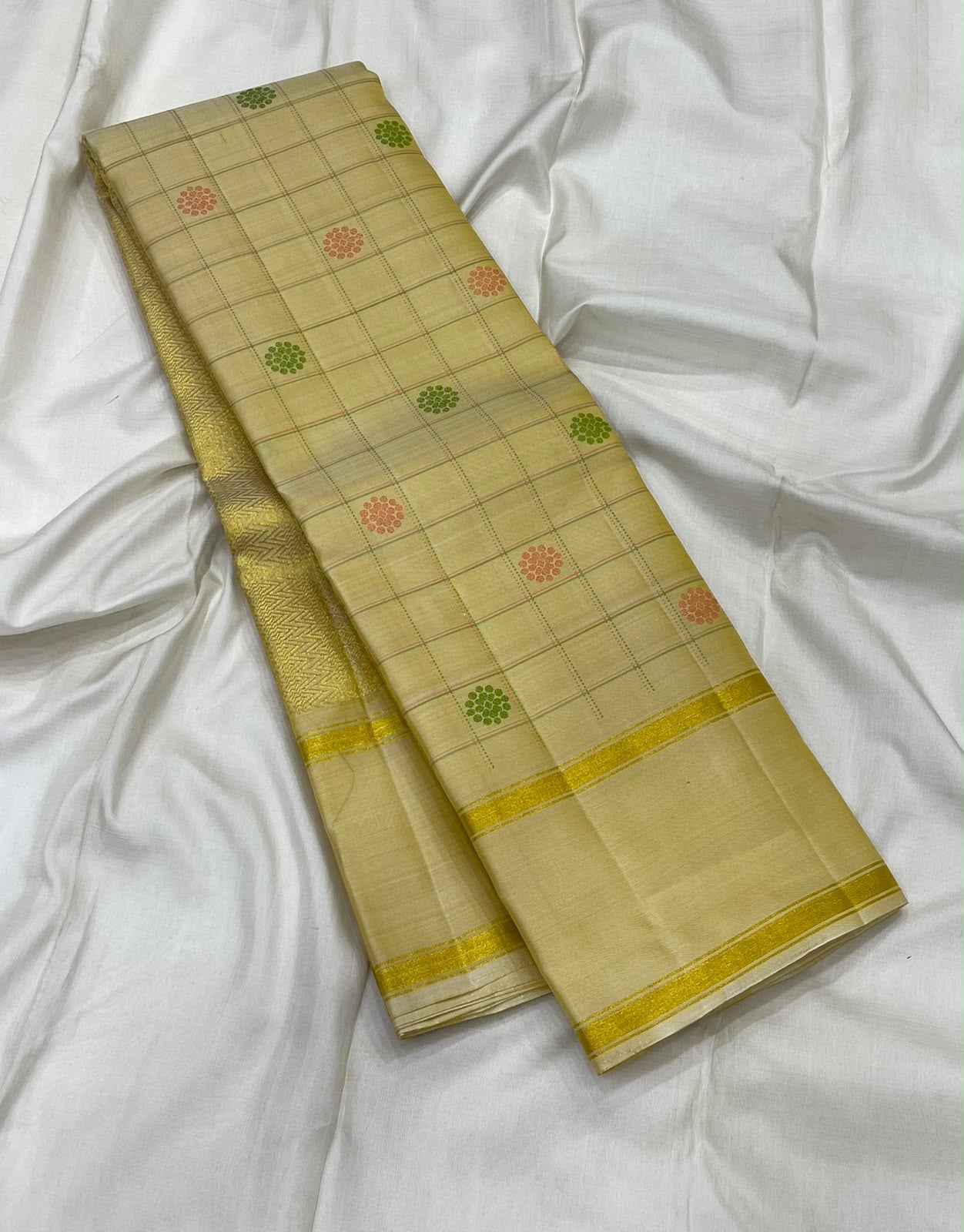 Cream Kanchi Kattam Kanchipuram saree folded, full view