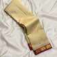 Kanchipuram cream Korvai saree with red Paisley zari border