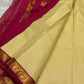 Cream Kanjeevaram saree with Paisley gold zari pallu