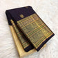 Cream tissue Kanjivaram saree with deep grape zari border