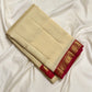 Cream Kanjivaram saree with red Paisley gold zari border