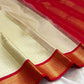 Red border with gold zari diamond lattice detail