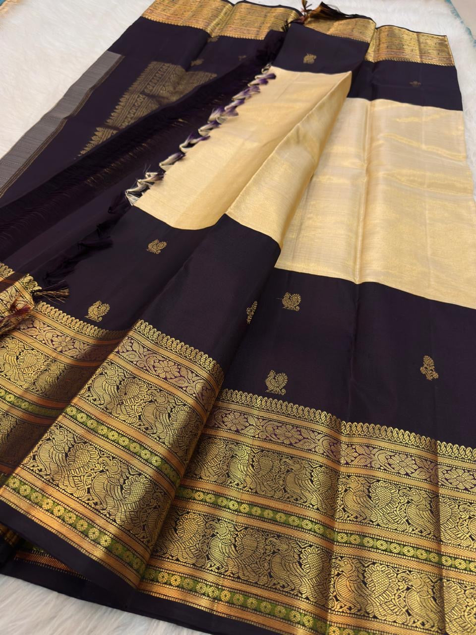 Kanchipuram cream tissue silk Butta saree with grape border