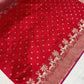Small silver-toned floral dot motifs on crimson Chanderi silk