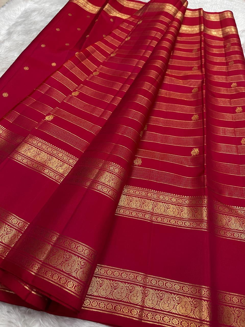 Crimson Kancheepuram silk saree with Rettapet weave and Maanga butta zari detail — Idam Living