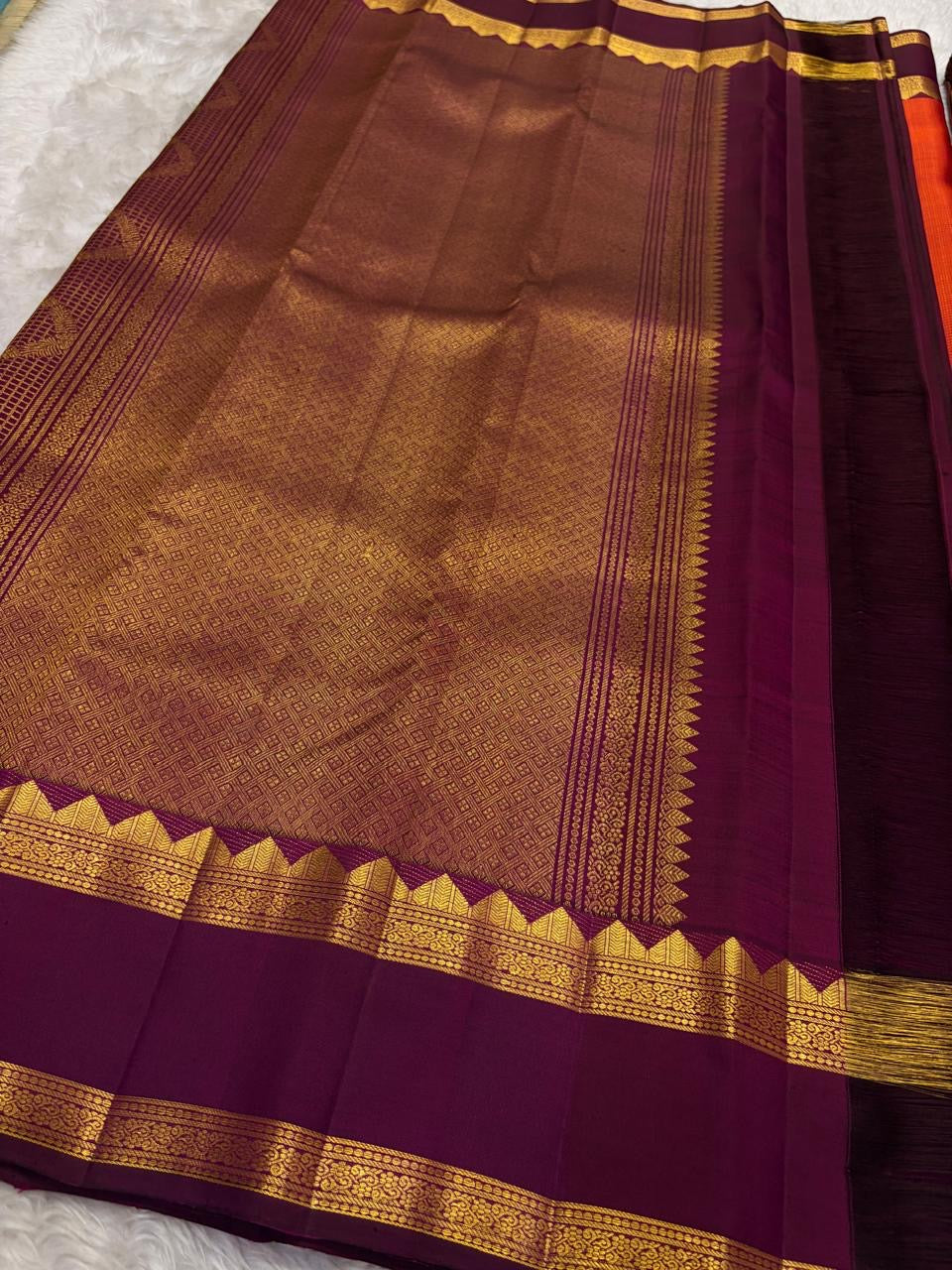 Crimson and Maroon Handwoven Pure Silk Kanchipuram Saree with Maanga Butta and Sorgavaasal Mayil Rettapet Border
