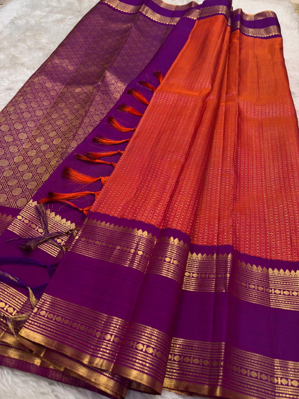 Crimson and Maroon Handwoven Pure Silk Kanchipuram Saree with Maanga Butta and Sorgavaasal Mayil Rettapet Border