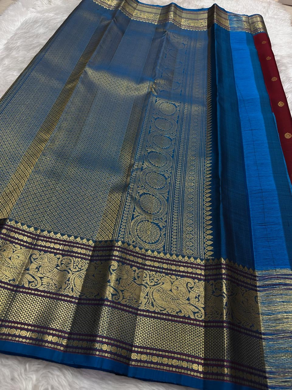 Crimson Maroon Kanchipuram Silk Saree with Peacock Blue Korvai Mayil Border