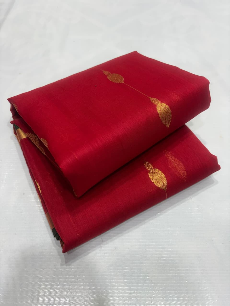 Antique-gold border on crimson-red Katan Silk Chanderi saree