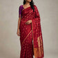 Crimson Red Chanderi Jari Silk saree showing scattered gold buttas, larger floral pallu motifs and metallic woven lines