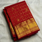Zari kattam body close-up on crimson red handwoven Kanchipuram silk saree — Idam Living