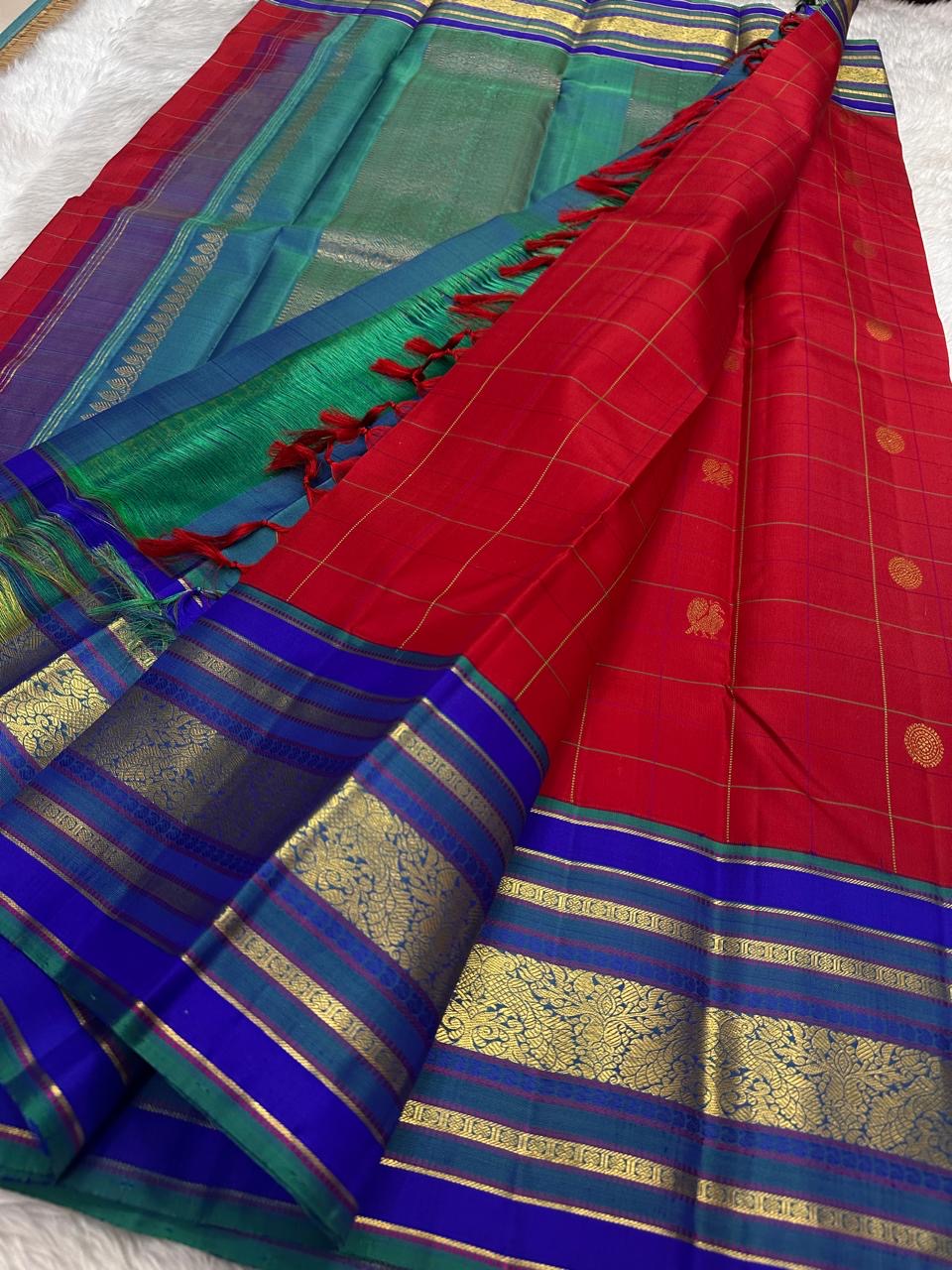 Crimson red Kanjivaram silk saree antique gold mayil chakram buttas