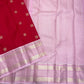 Rose-pink woven Kanchipuram pallu with subtle chevron geometry and luminous metallic detailing.