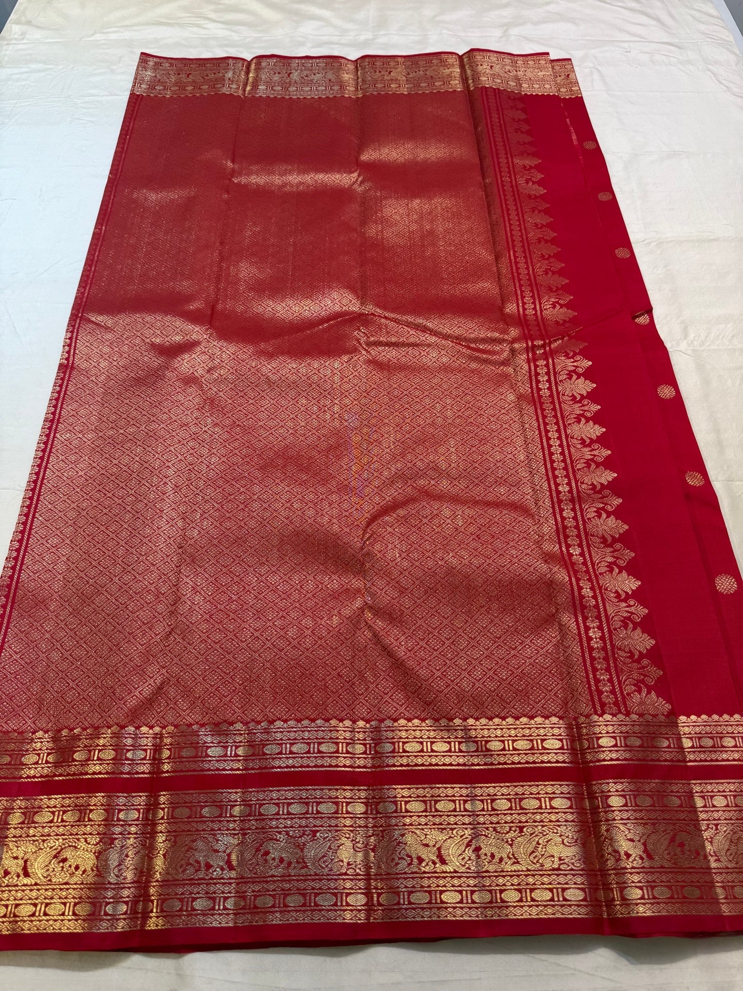 Crimson Varisaipet pure silk Kancheepuram saree with gold peacock-elephant border — full overview — Idam Living