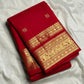Pallu detail showing gold Varisaipet band with peacock and elephant motifs, crimson Kancheepuram saree