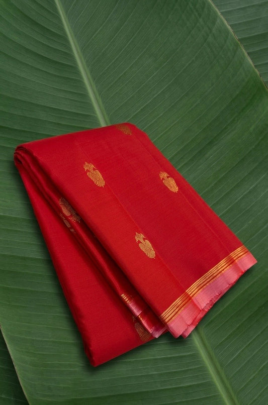 Crimson vermilion Kanchipuram silk saree with antique gold Gandaberunda buttas