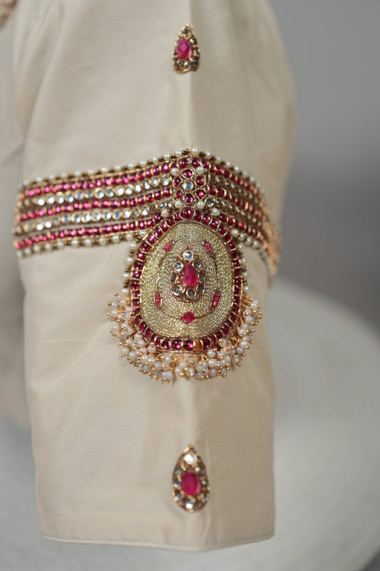 Cream silk Tanjore Treasure designer blouse with hand-set kemp stone embroidery