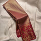 Dense champagne-gold Kanchipuram silk body with fine chevron zari lines