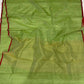 Close view of green Chanderi silk with gold woven buttas, deep red border and fine gold zari