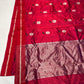Folded Raspberry Red Chanderi saree showing the silver floral buttas and fine silver border