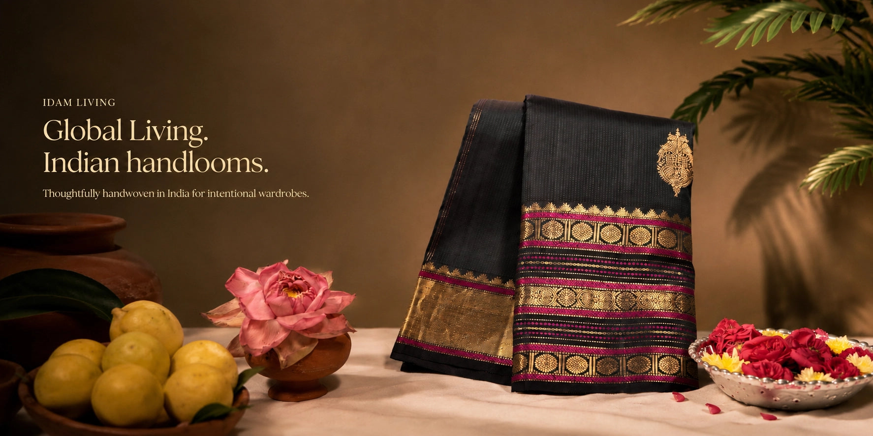 Pure Kanjivaram silk saree luxury ecommerce hero banner for Idam Living with rich handwoven texture