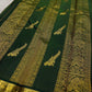 Ornate self-colour Mayil peacock border of dark bottle green Kanjipuram saree with dense antique gold zari Varisaipet bands