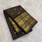 Dark Brown Kanchipuram silk saree showing a lightweight kanchipuram body animated by fine vairaoosi needle-like linear striping and small spaced zari buttas.
