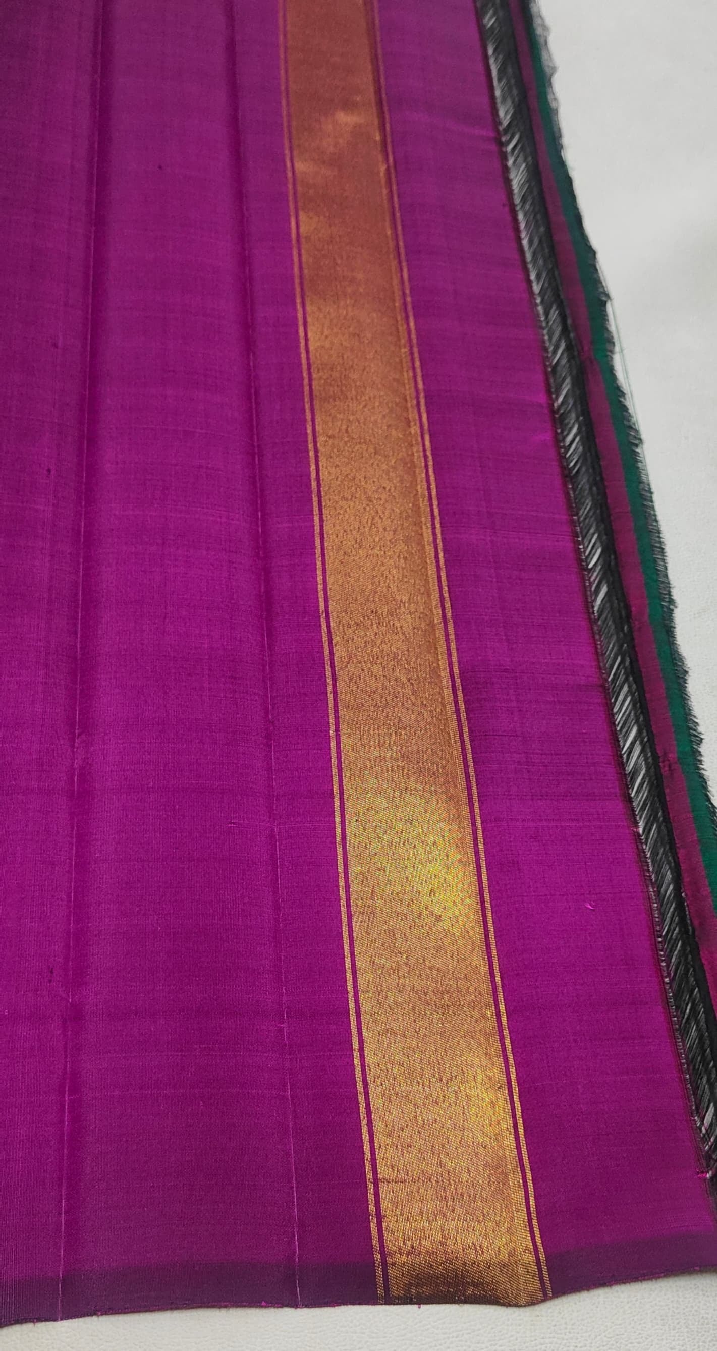 Dark chocolate brown and magenta Ettukol Kanjivaram silk saree, folded front view — Idam Living