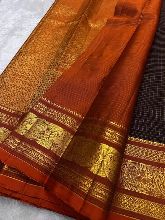 rust border detail of dark coffee brown Kanchipuram silk saree