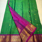 Magenta border with dense gold zari vanasringaram panels on forest green KanchiPattu saree — Idam Living