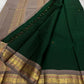 Pure Kanchipuram silk saree pallu detail in brown tone with woven gold zari elements