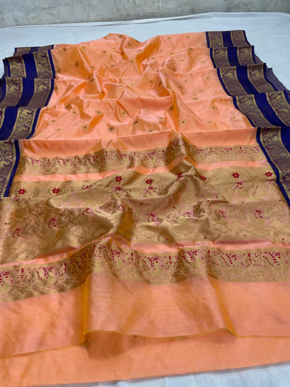Full Apricot Peach handloom Chanderi saree with floral buttas, Royal Blue border and metallic woven pallu