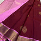 Deep Arakku Kanchipuram silk saree with luminous soft pink Pettu border