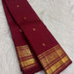 Arakku Plum Pure Silk Kanchipuram saree with all-over Poo-Kodi antique-gold zari Jaal