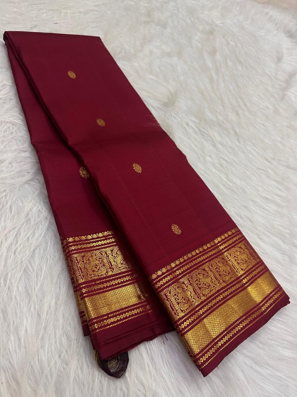 Arakku Plum Pure Silk Kanchipuram saree with all-over Poo-Kodi antique-gold zari Jaal