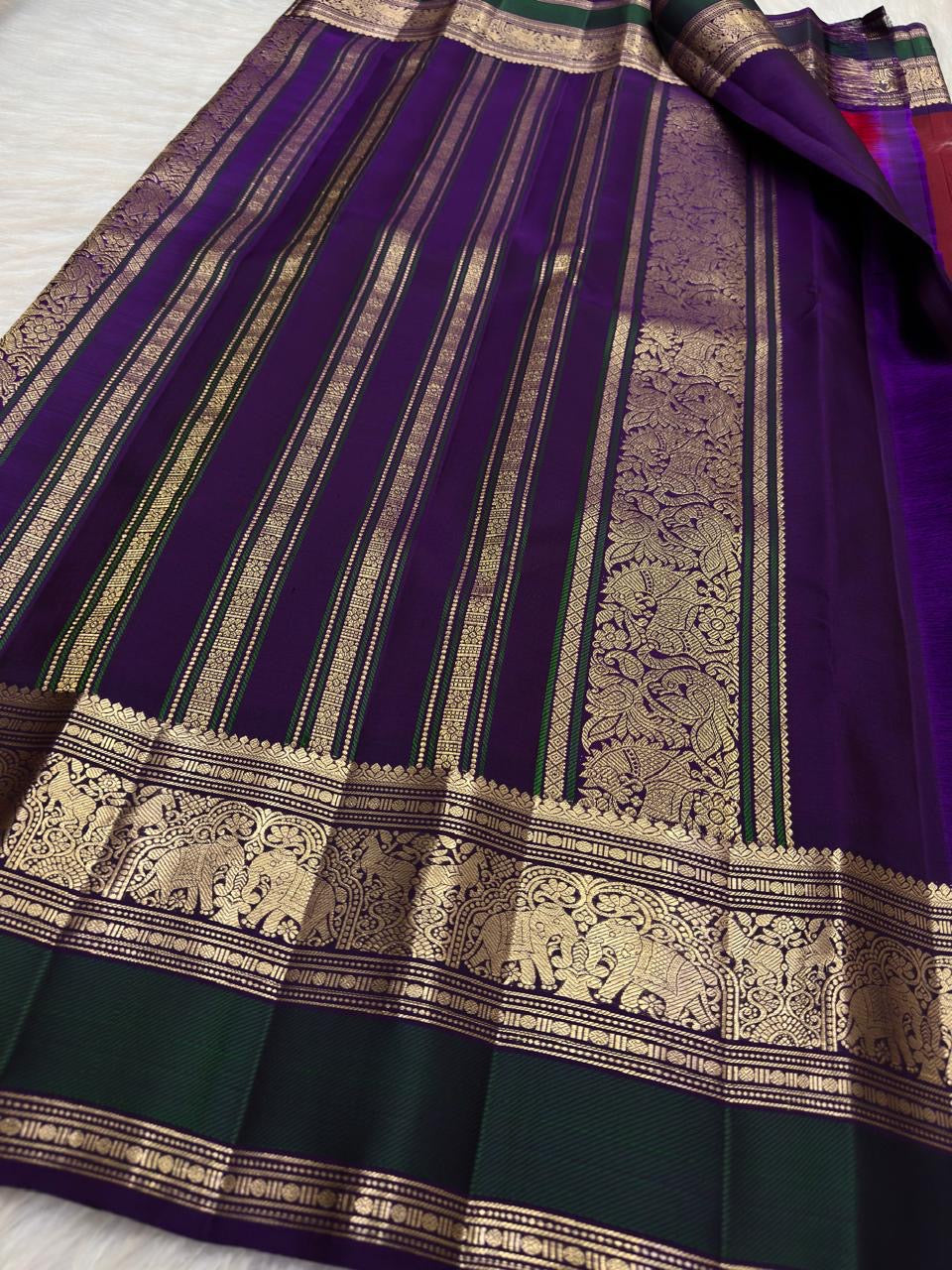Deep Arakku Maroon Handwoven Pure Silk Kancheepuram Butta Saree with Yaanai Gold Zari Border