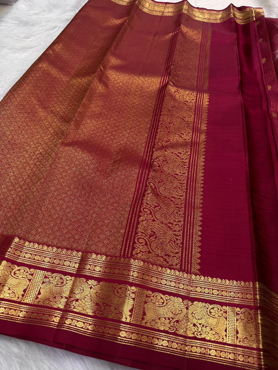 Arakku Vairaoosi Kancheepuram saree with vertical zari stripes