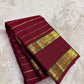 Deep Arakku Red pure silk Kanchi Pattu Rettapet saree with lengthwise Veldhari gold zari.