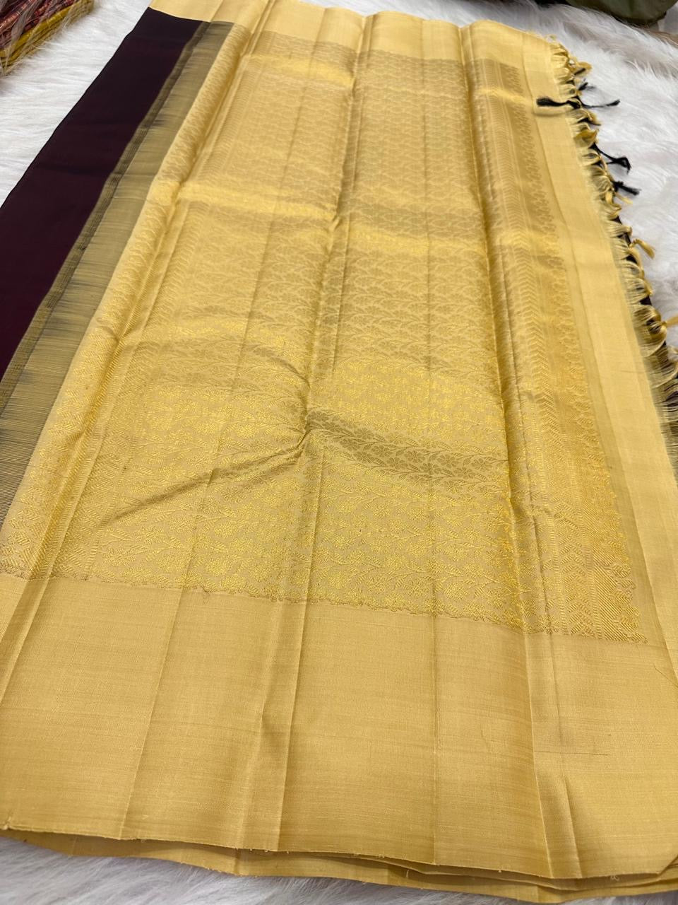 Deep aubergine Kanchipuram silk saree with butter yellow pallu, pallu view