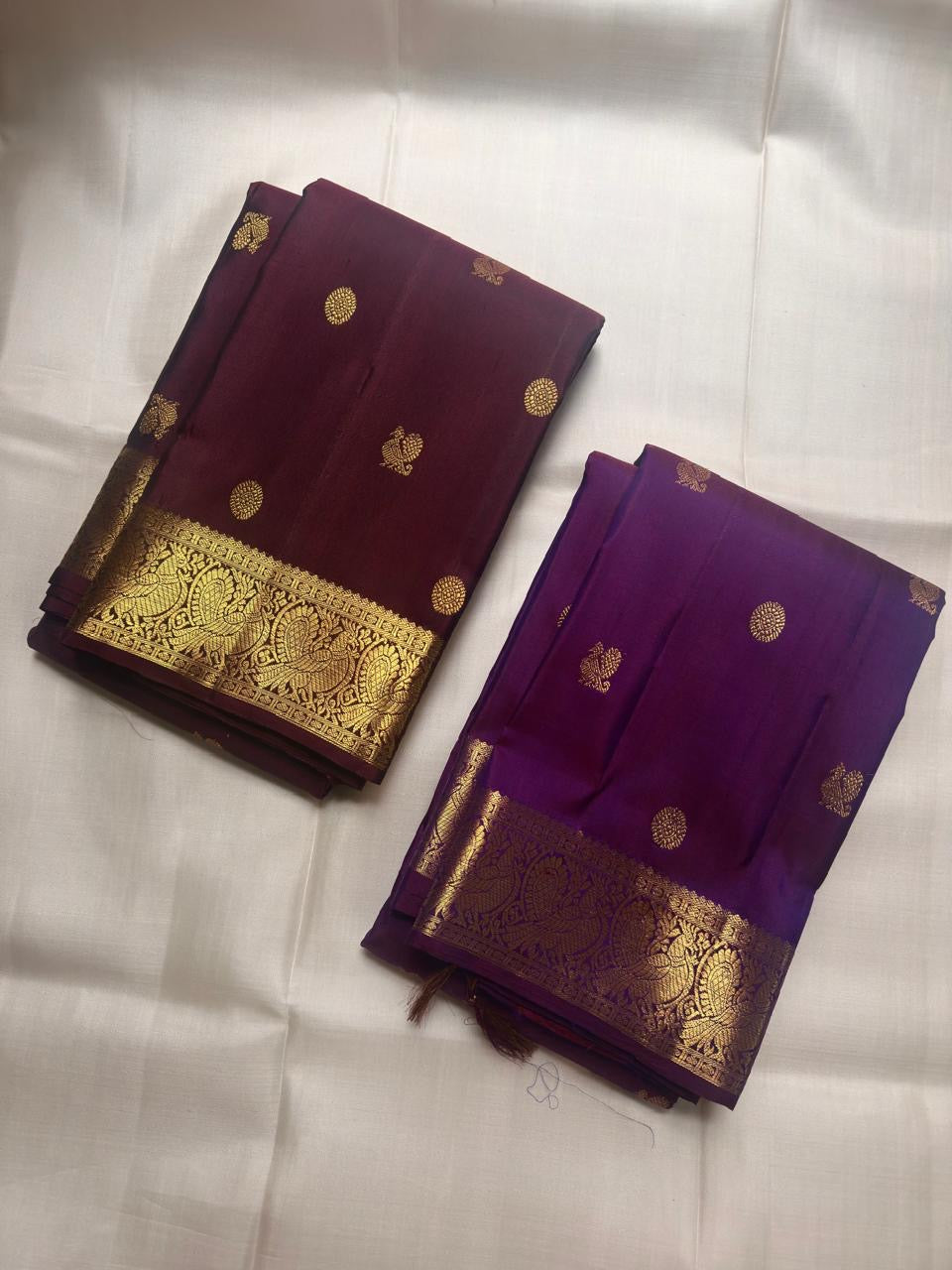 Handwoven aubergine Kanchipuram silk saree with alternating antique gold zari buttas